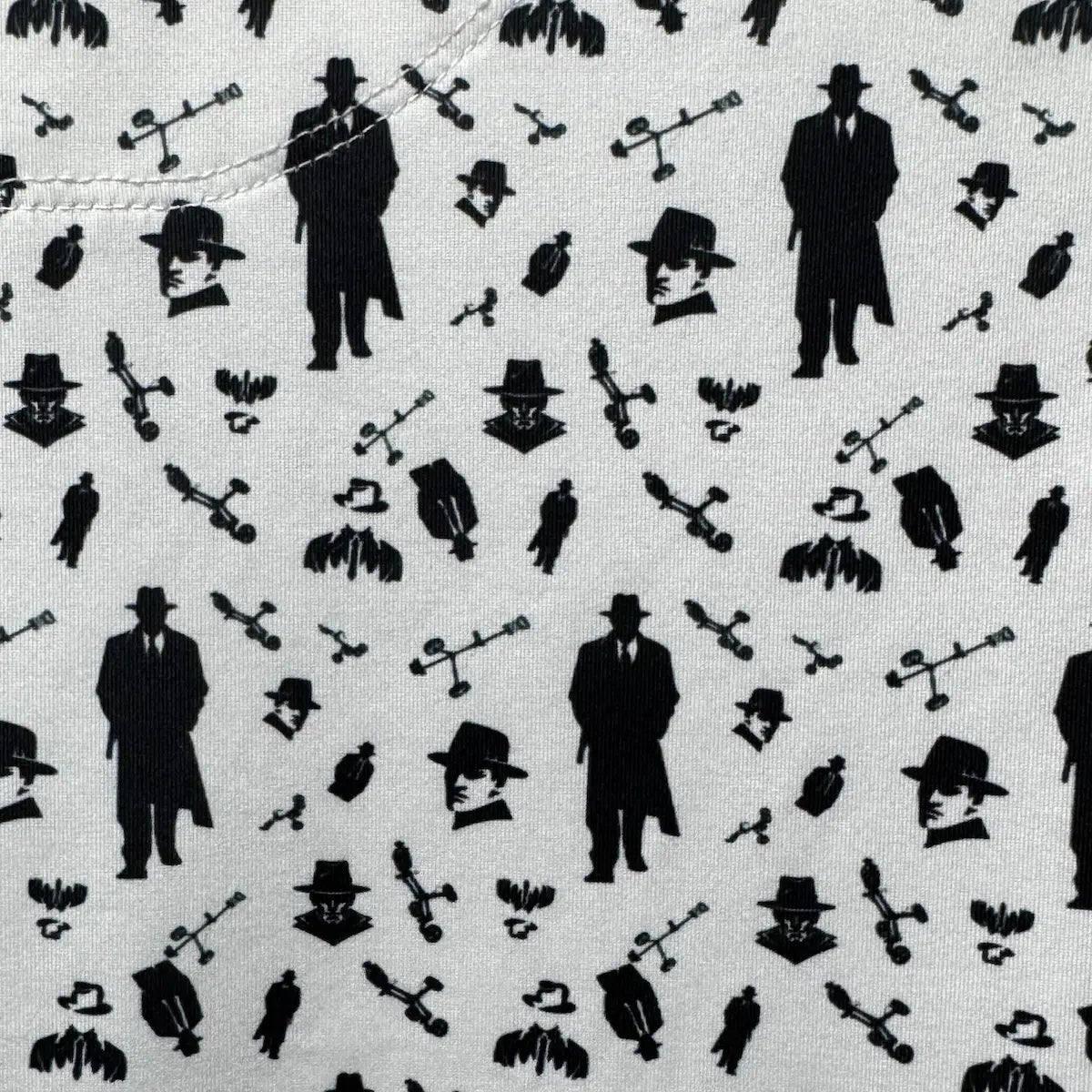 Pattern of mobster iconography and golf push cart from the Mafioso Polo from Green Ferret Golf.
