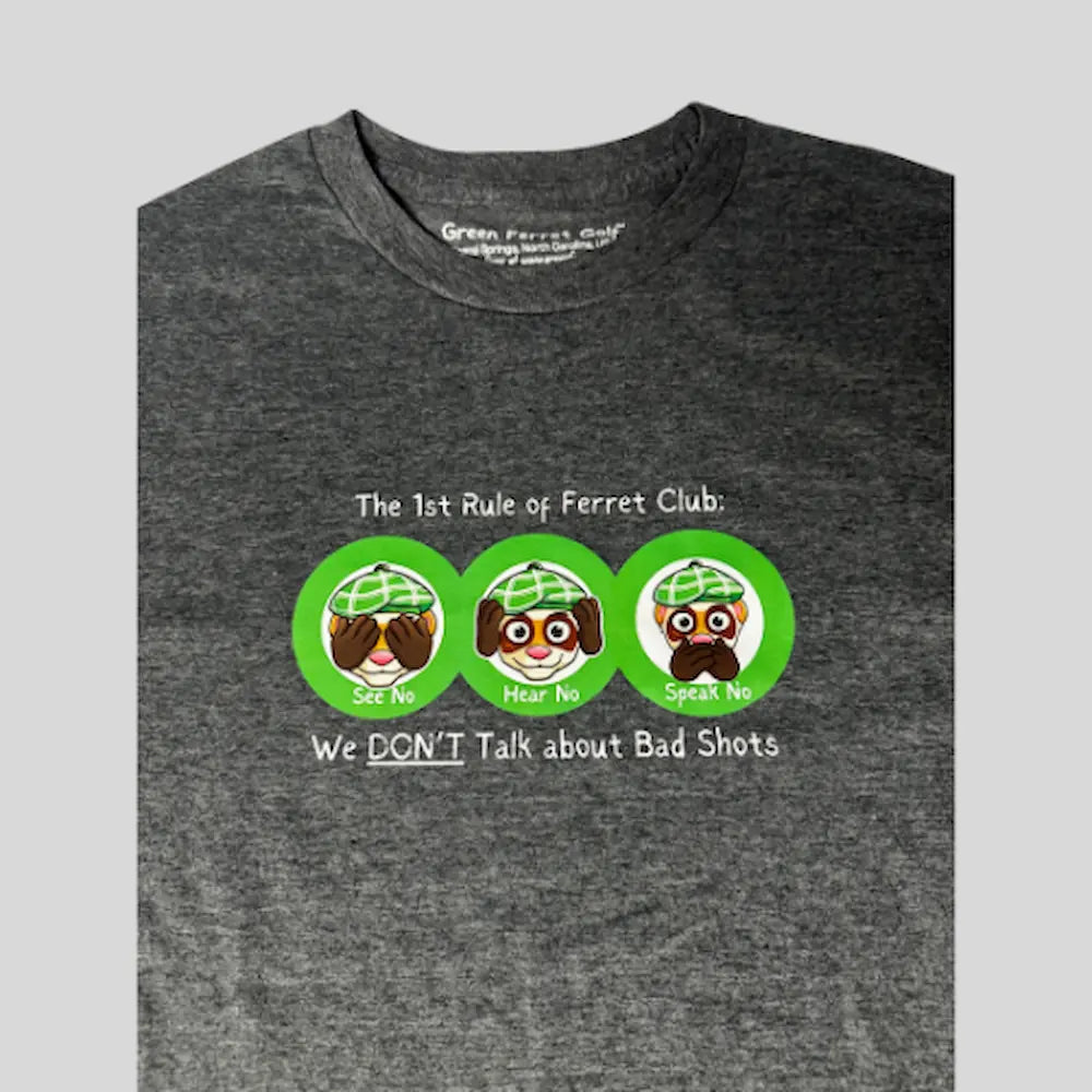 Gray t-shirt with a graphic design featuring the first rule of Ferret Club: We Don't Talk About Bad Shots from Green Ferret Golf