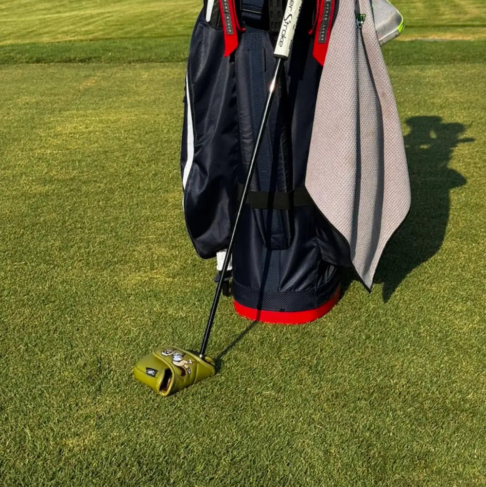 Finneus Mallet Cover agains a golf bag at Monroe Country Club