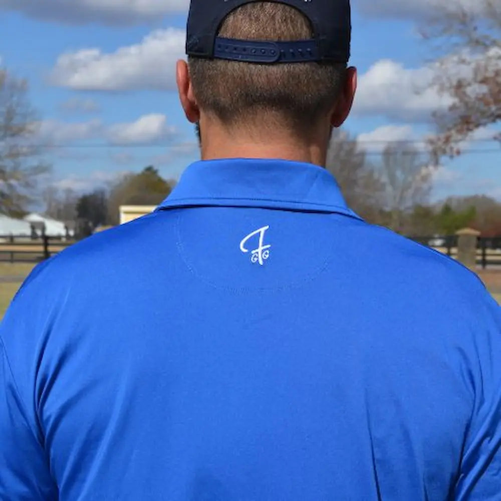 Detail of the GFG Logo on the back of the Players Quarter Zip Jacket in Royal Blue from Green Ferret Golf