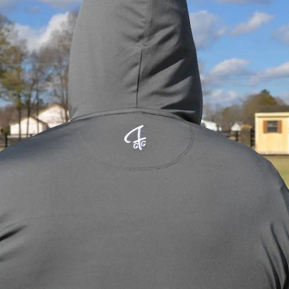 Detail of the GFG logo on the Yoke of the Players Pullover Hoodie in Steel Grey from Green Ferret Golf