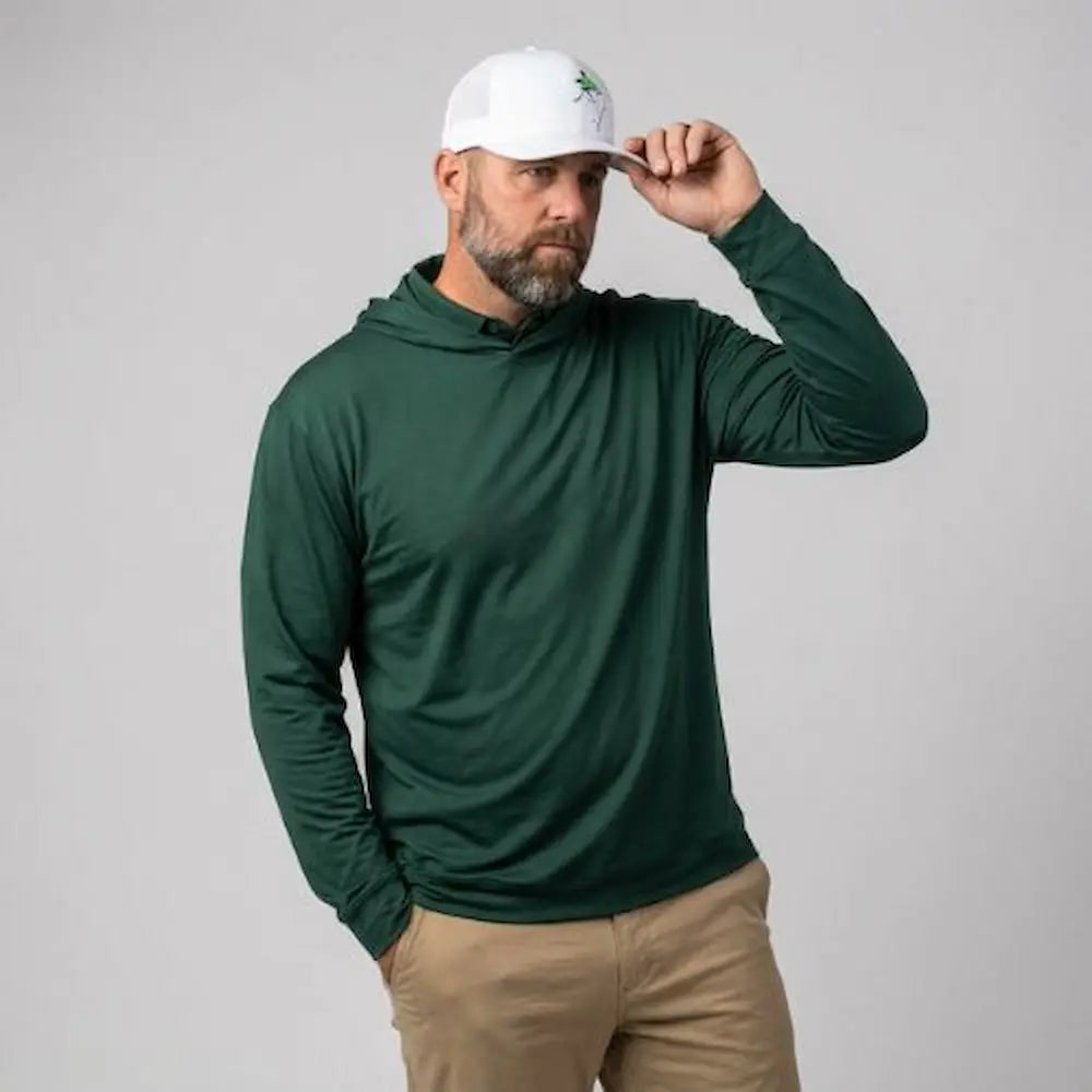 model wearing Players Pullover Hoodie in Forest Green from Green Ferret Golf