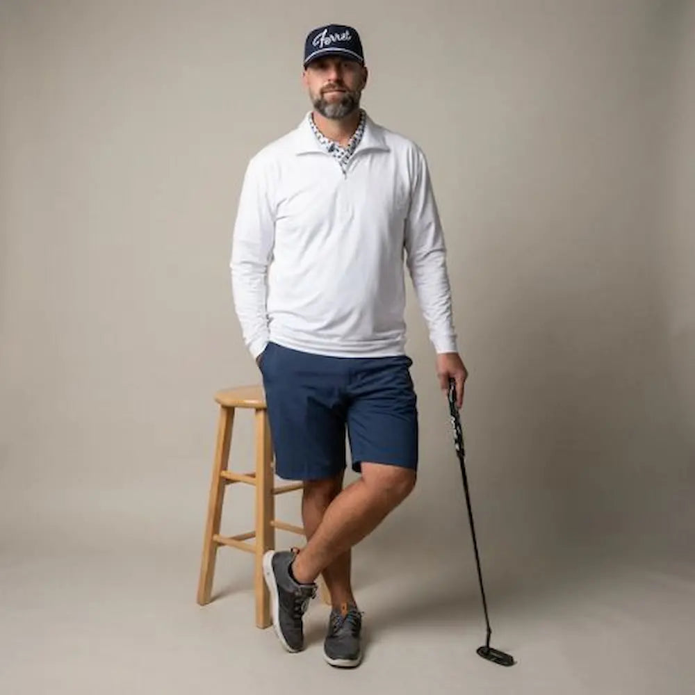 Model wearing Players Quarter Zip jacket in white from Green Ferret Golf