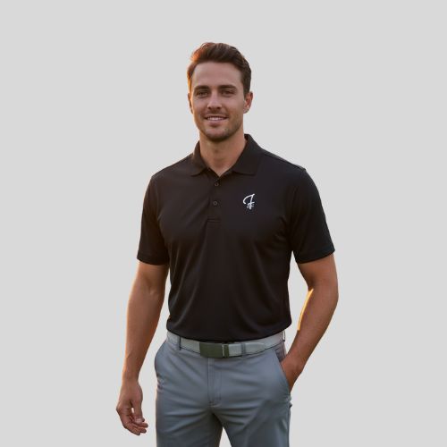 Man wearing a black polo shirt with a  Green Ferret Golf logo on a plain background