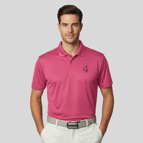Man wearing a pink polo shirt with a Green Ferret Golf logo on a light gray background