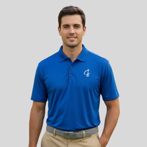 Man wearing a blue polo shirt with a logo on a gray background