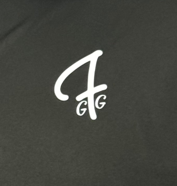 White monogram on a dark green background