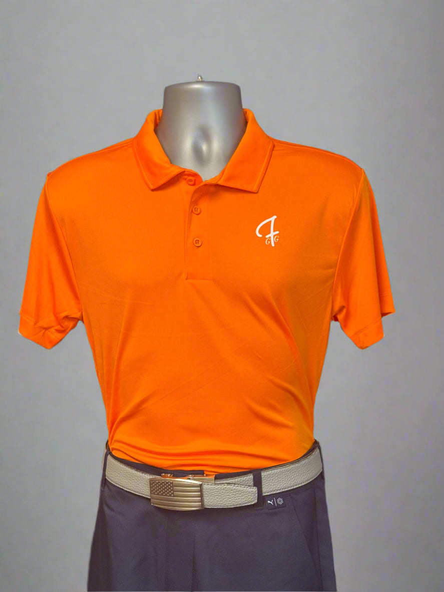 Orange polo shirt with a logo on a mannequin against a black background