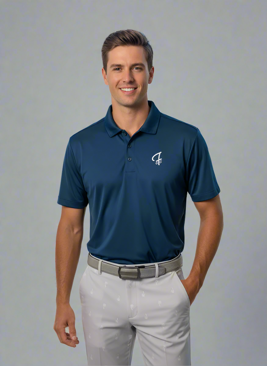 Man wearing a blue polo shirt with a logo on a golf course
