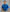 Man wearing a blue polo shirt with a logo on a golf course