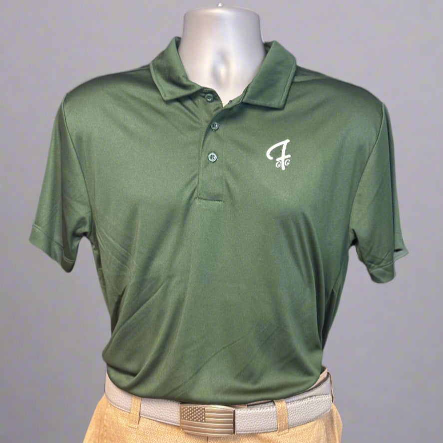Green polo shirt with a logo on a mannequin against a dark background
