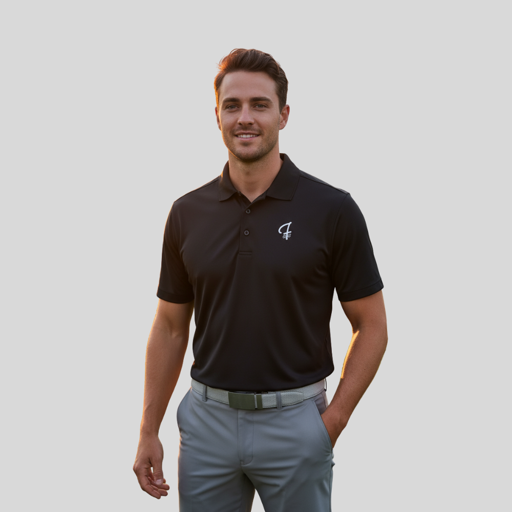 Man wearing a black polo shirt with a Green Ferret Golf logo on a plain background