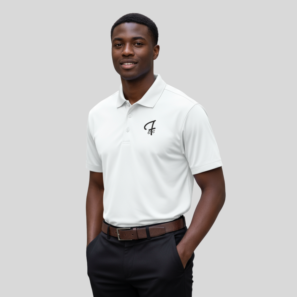 Man wearing a white polo shirt with a Green Ferret Golf logo on a plain background