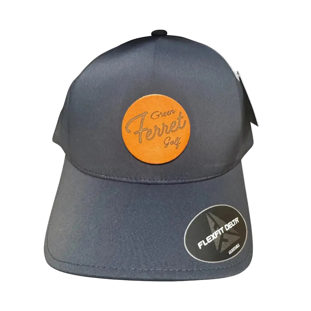 Navy adjustable cap with a leather patch and Green Ferret Golf in script